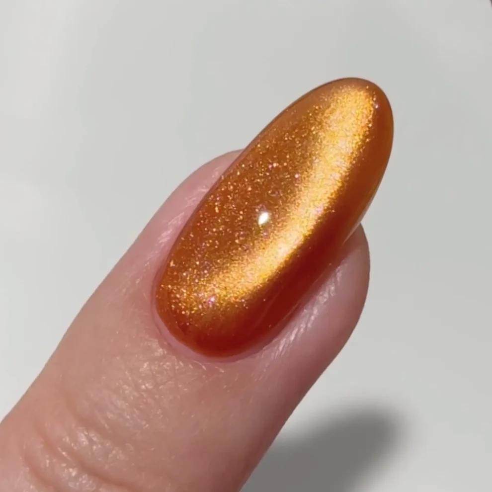 DND - DC 9D Cat Eye - Catch A Tiger - Gel Polish at Beyond Polish