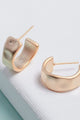 Hammered Huggie Hoops - Earrings at Beyond Polish